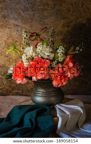 Still life with a Beautiful flowers in old vase, beautiful style.
