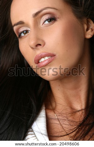 Close-up portrait of beautiful woman half face with professional makeup
