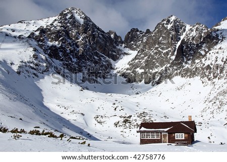 Rocky mountains with small wooden house (Slovakia, High Tatry)