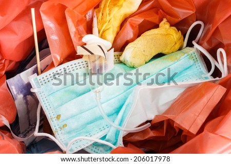 infectious wastes (gauze,mask,iv fluid,syringe in bin)