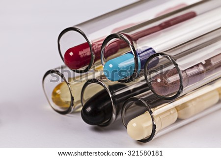 Medical background with pills and test tube