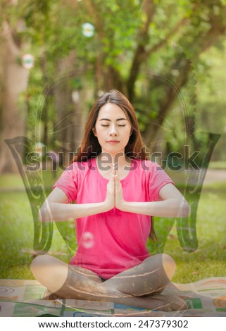 Double exposure woman yoga with Ancient Buddha face