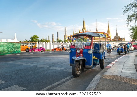 BANGKOK, THAILAND - JULY 11, 2015: Tuk tuk for passenger cars. To go sightseeing around the Grand Palace in Bangkok , Thailand. Grand Palace is the most famous temple and landmark of Thailand.