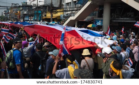 Bangkok, Thailand - Dec 9, 2013 : At Victory monument, Thai anti-government protesters rally from SCB park to downtown Bangkok.