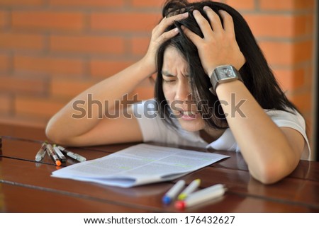 The girl stress before exam.