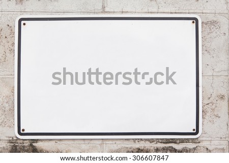blank metal white on old cement brick background