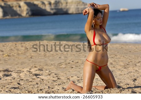 stock photo Sexy topless beach girl
