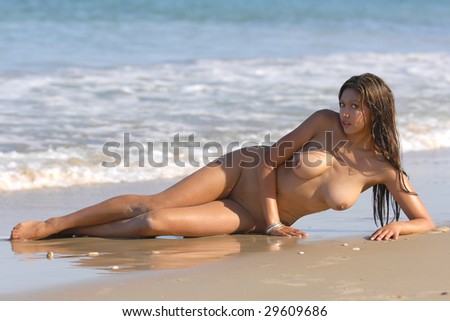 stock photo Naked woman posing on beach