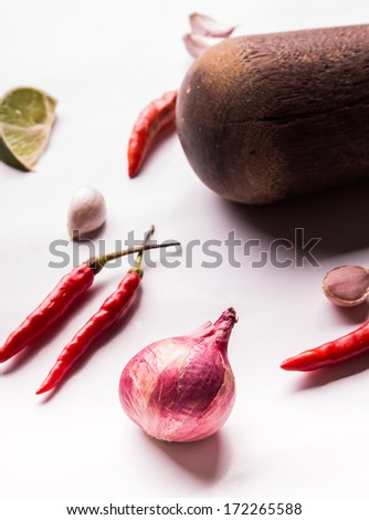 herbs and spices with wooden ladle isolated on white background
