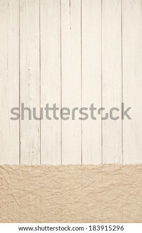 Sepia white boards in vertical orientation with tan burlap on side.