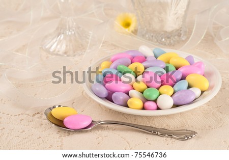 Elegant Table Setting for a Party with Jordan Almonds in Dish with Copyspace or Room for your text or words