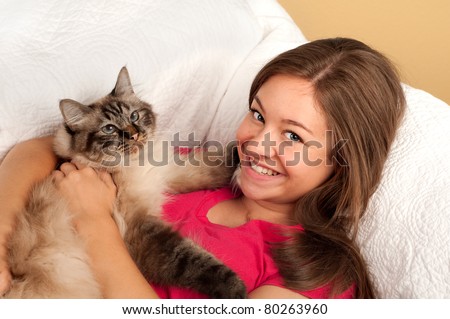 Pretty Teen Girl with Her Kitty