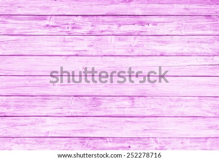 Painted Plain Red Pink Rustic Wood Board Background that can be horizontal or vertical. Blank Room or Space area for copy, text,  your words, above looking down view. Tinted photo.