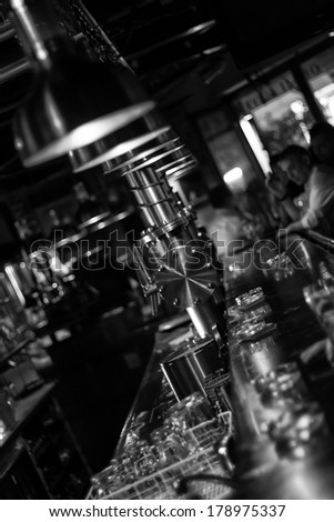 Moody bar in black and white