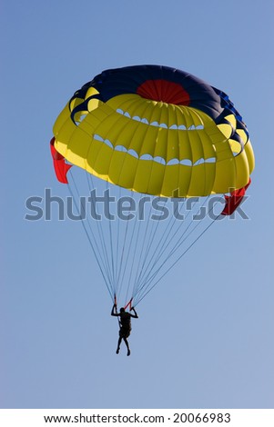 Parachute flying over blue sky