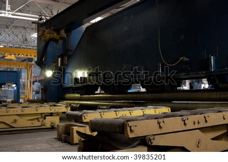 industrial machine for bending metal sheets