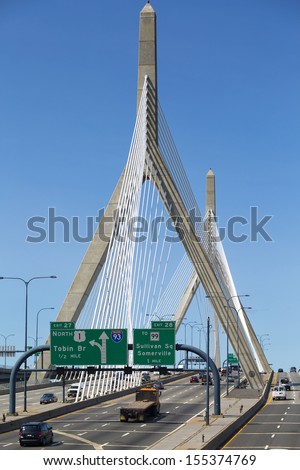 BOSTON, USA - JULY 18: Zakim Bridge, a cable-stayed bridge across the Charles River in Boston, MA is the world\'s widest cable-stayed bridge with 10 lanes as seen in this photo taken on July 18, 2013.