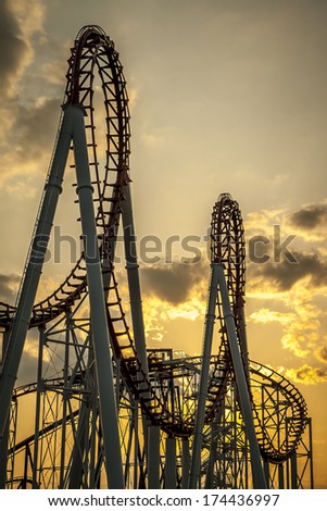 Loops of a roller Coaster at Sunset.