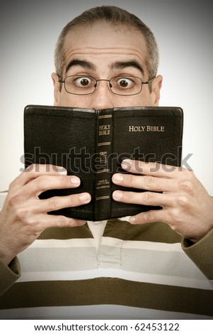 Man Holding the Holy Bible