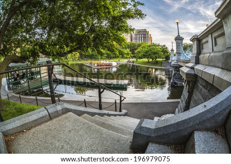 BOSTON, USA - JUNE 2: Panoramic view of the Boston Public Garden in Boston, Massachusetts, USA at sunset with some locals and tourists enjoying the nice weather and gardens on June 2, 2014.