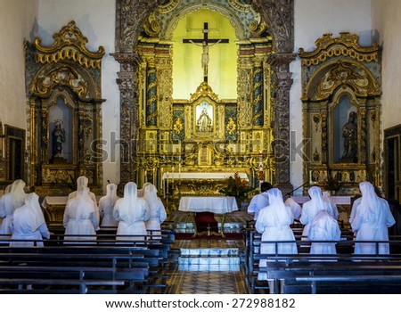 OLINDA, BRAZIL - APRIL 26: The interior architecture of the Nossa Senhora da Misericordia church with its golden altars and sculptures during a service on April 26, 2015 in Olinda, PE, Brazil.
