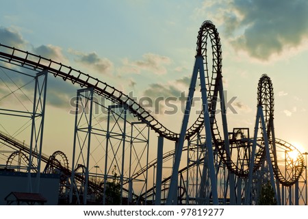 Roller Coaster loops in the sunset.