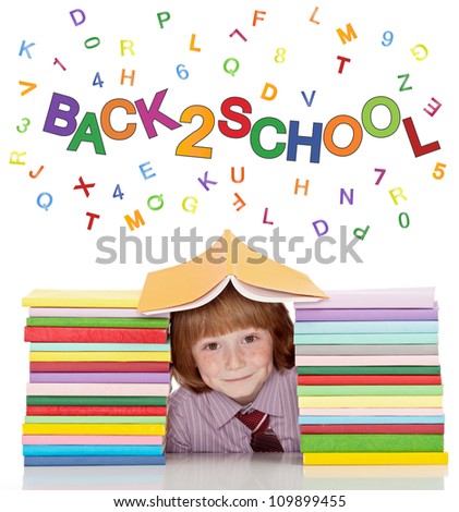Small school boy with shirt and tie and lots of books having fun - isolated
