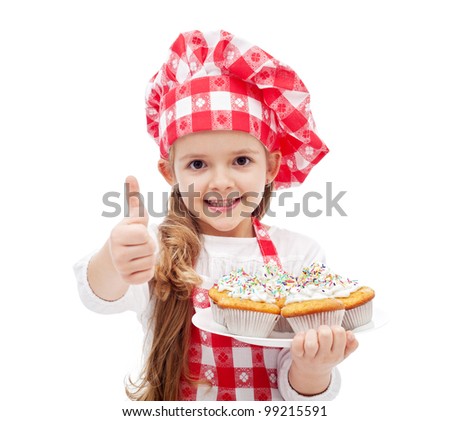 My first muffins are ready little girl with chef hat and cookies isolated My first muffins are ready little girl with chef hat and cookies isolated