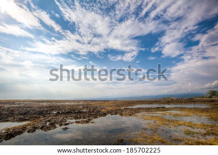 Blue sky with rocks at Muara Jayanti Beach in south of West Java Indonesia