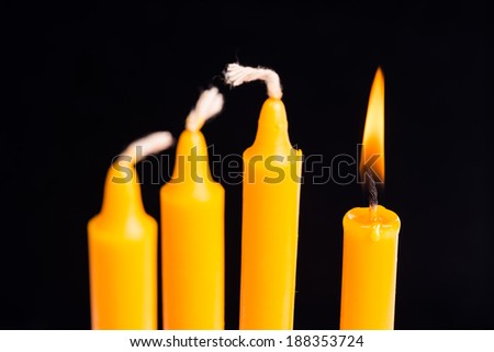 A candle is ligt up,Concept of be different.