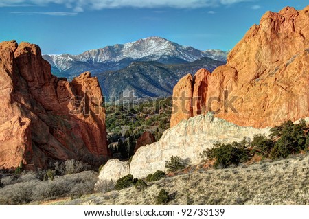 Rock formations at Colorado Springs\' Garden of the Gods, with Pikes Peak in background