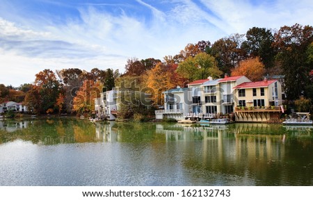 Autumn Landscape Of Luxury Homes On The Waterfront Of Lake Anne In The Planned Community Of Reston, Virginia.