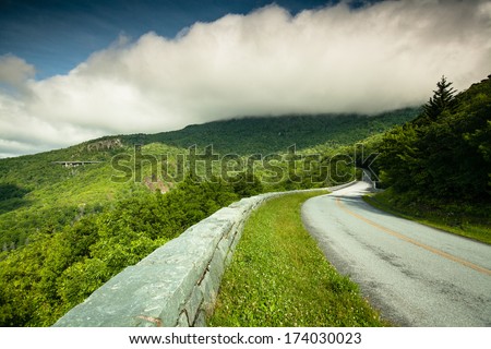 Blue Ridge Parkway in Western North Carolina under storm clouds.