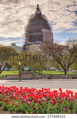 The US Capitol dome in Washington, DC is covered with scaffolding as it undergoes a facelift to restore cracks in the cast iron architecture.