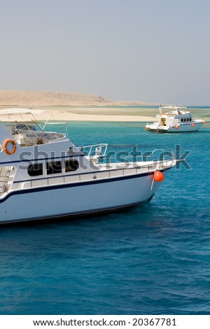 Yachts by an island in the Red Sea
