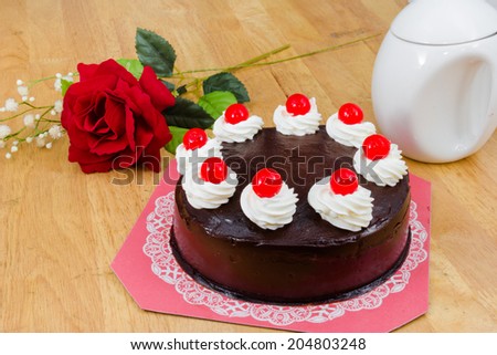 chocolate cake with red Jelly on top
