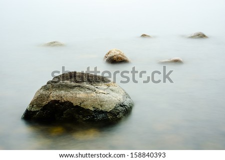 Rocks in the fog water