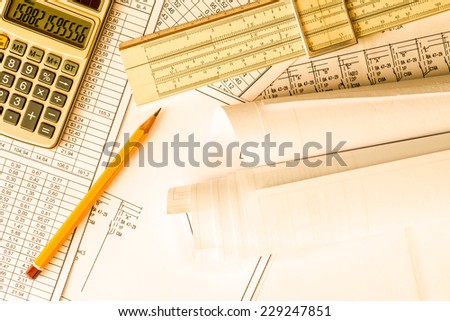 Rolls of drawings, calculate and record the results of calculations. In yellow tone