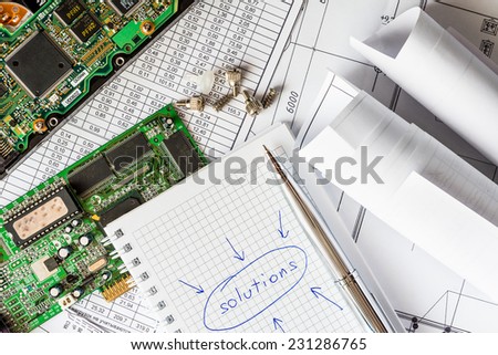 Plan for the repair of the computer, a notebook with solutions and a pen