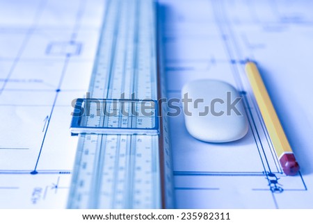 Workplace of engineer, tools for sketching and a drawings. Angle view, in soft tone