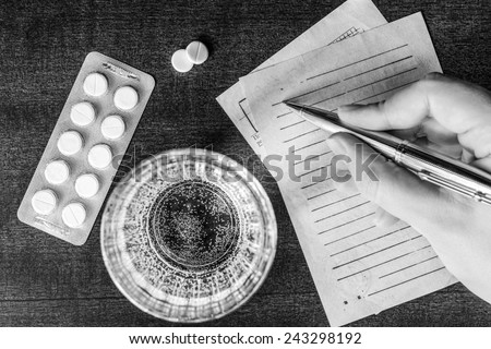 Cure the disease, a doctor prescribe the right tablets in the recipe. In the black and white tones