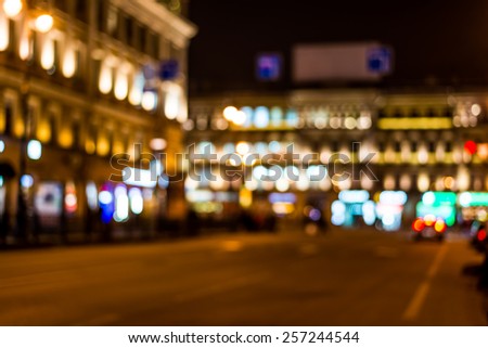Night city, night life on the streets, the buildings in lights in the background