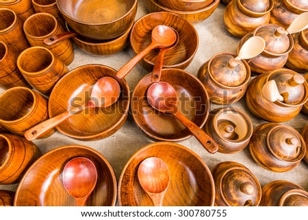Different wooden utensils on the storefront window