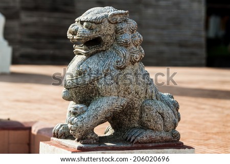Lion statue in front of temple
