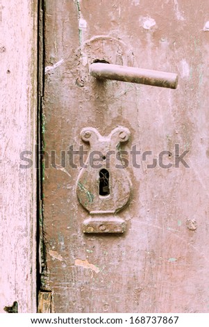 Door latch  from a metallic painted door