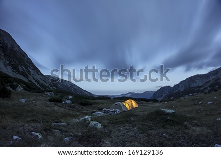 Romanian mountain landscape with tents