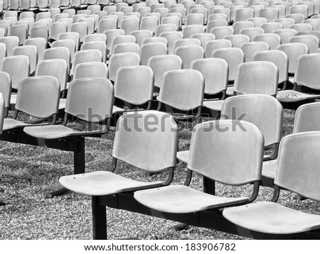Black and white, abstract composition, background and texture from backrest of the seats and seats outdoors