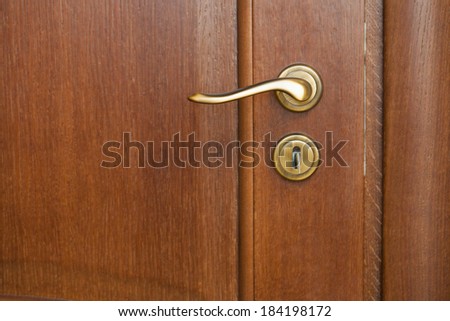 Wood texture with metallic latch and lock with key for backgrounds