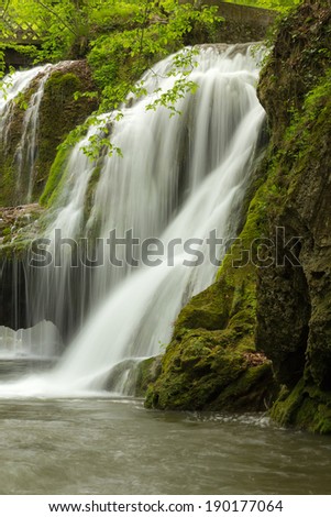 Waterfall landscape in Romania with beautiful green and waterfall named Bigar