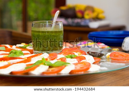 Appetizers arrangement for anniversary party with cheese and tomatoes